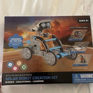 Never used solar robot creation kit!  Great gift